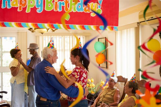 People Enjoy Birthday Party With Friends In Geriatric Hospital