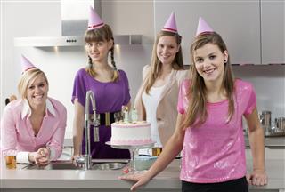 Teenage girls celebrating 16th birthday