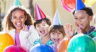 Multiracial children at a birthday party