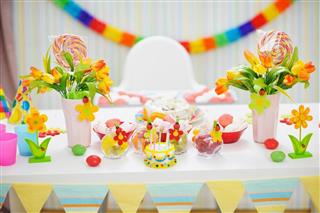Closeup on table decorated for children celebration party