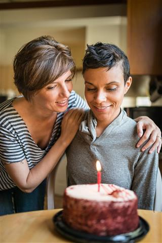 Lesbian couple share the kiss for the birthday