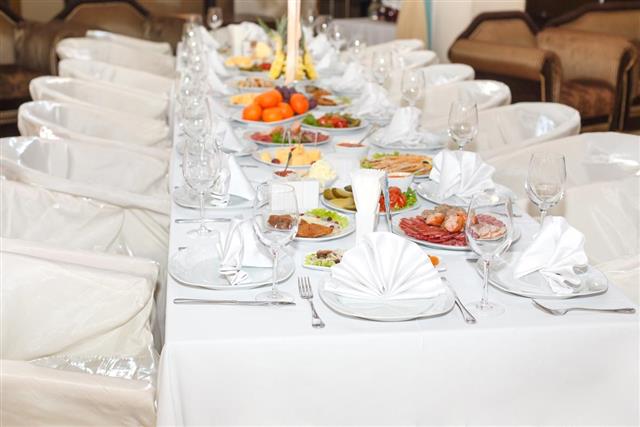 Cutlery on the white banquet table
