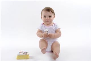 Small Child With Birthday Cake