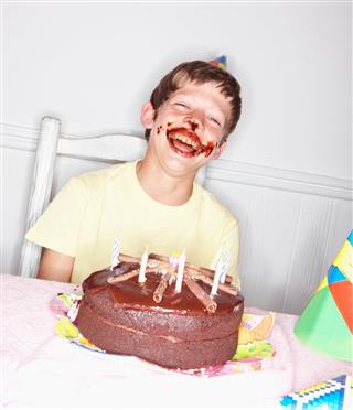 Laughing Boy After Eating Cake