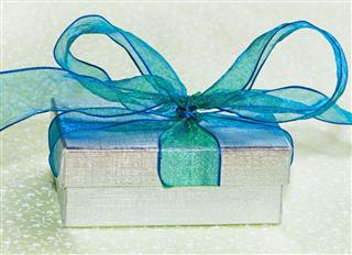 Silver Gift Box With Blue Bow