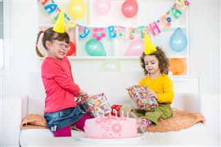Two Little Girls On The Birthday Party