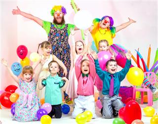Children Party with Cheerful Clowns