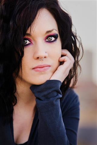 Woman Dramatic Eyes And Nose Piercing