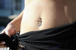 Female Belly With A Piercing