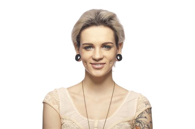 Portrait Of A Young Tattooed Woman