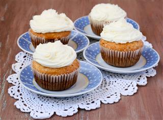 Coconut Cupcakes On Saucers