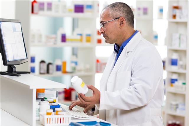 Pharmacist Filling Prescription