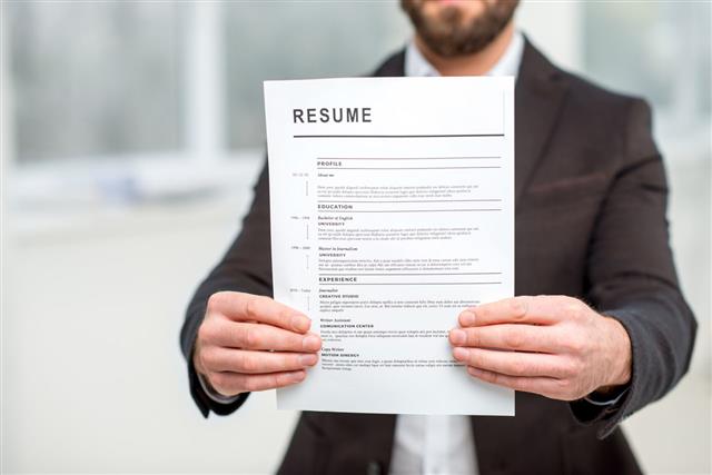 Holding Resume Paper