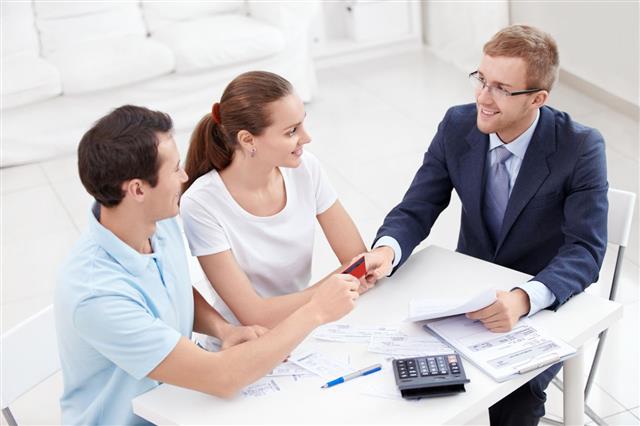 Couple Meeting With Financial Advisor