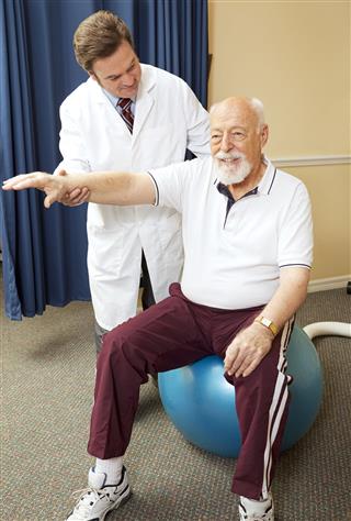 Doctor Gives Physical Therapy