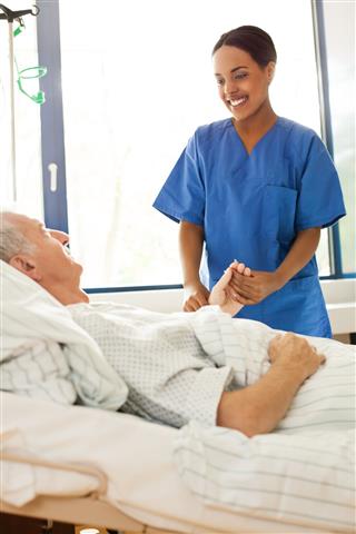 Nurse Caring For A Senior Patient
