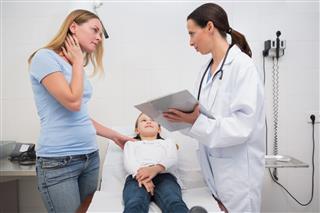 Child In A Hospital Examination Room
