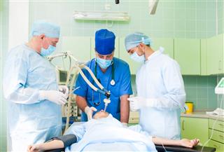 Surgery Team Working Operating