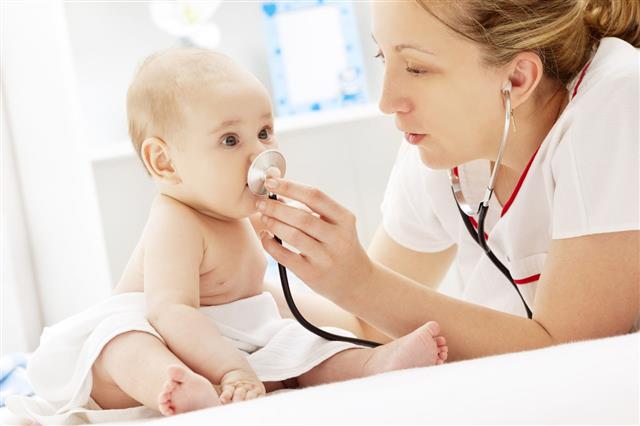 Pediatrician Checking Baby Patient
