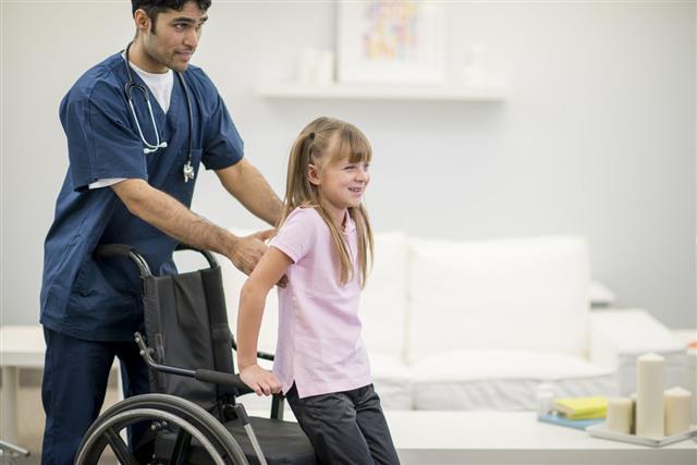 Little Girl In Wheelchair At Hospital