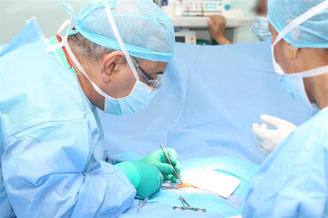 Doctor Making Suture During Operation