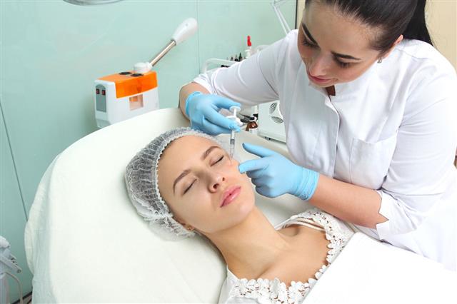 Doctor Woman Giving Botox Injections