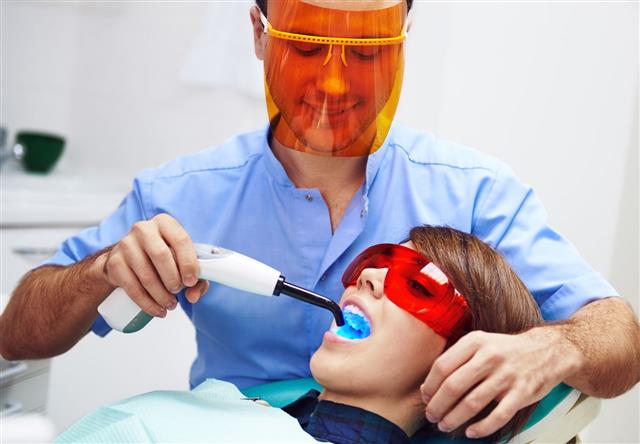 Dentist With Patient