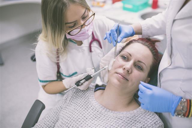 Cosmetologist Making Botox Injection