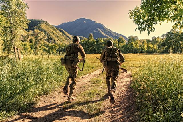 Two Combat Soldiers Running