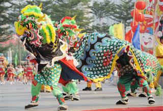 People Performing Chinese Dragon Dance