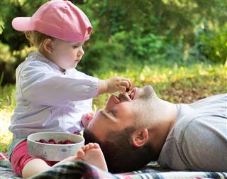 Father And Daughter Having A Picnic