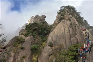 Walking Hikers In The Huangshan Mountains