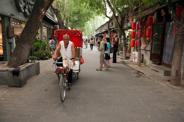 Rickshaw In Old Hutongs Of Beijing