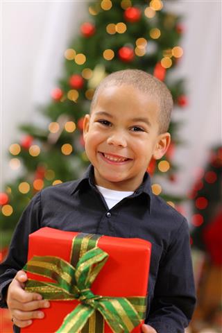 Young Boy With Christmas Gift