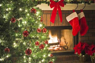 Christmas Tree And Decor Around Fireplace