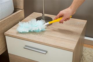 Removing Dust With Duster Feather