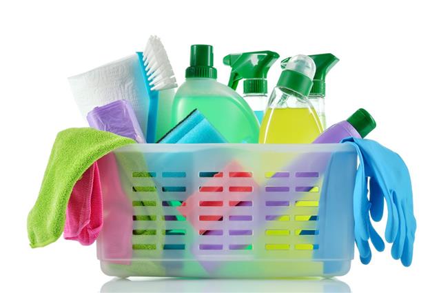 Basket Of Cleaning Supplies And Cloths