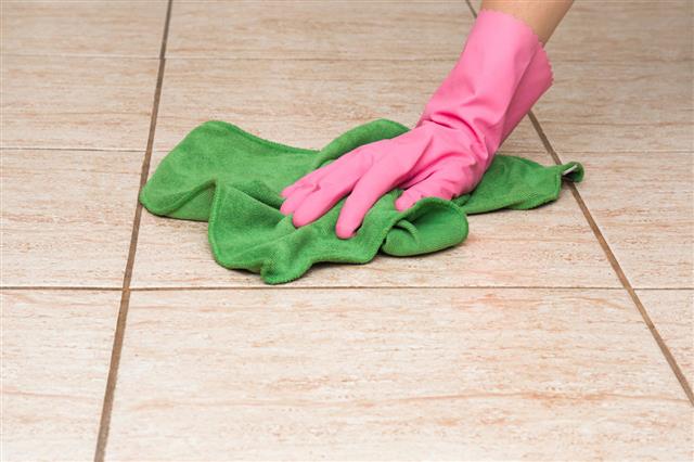 Cleaning Tiles With Rag