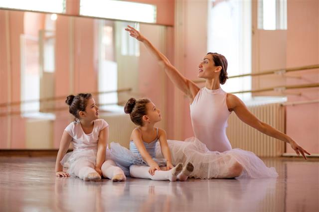 Ballet Instructor With Two Little Girls