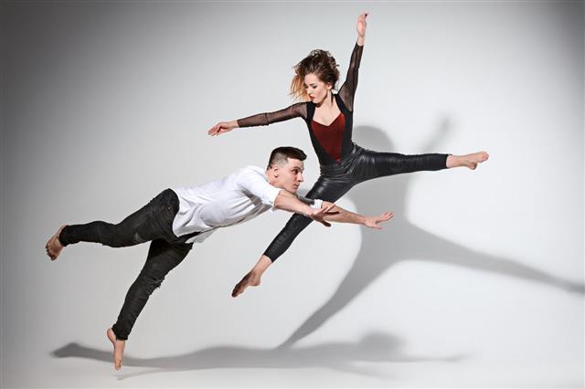 Two People Dancing In Contemporary Stile