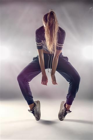 Female Hip Hop Dancer With Hair Covering Her Face