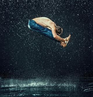 The Male Break Dancer In Water