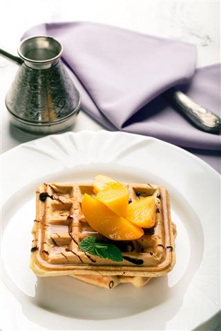 Viennese Waffles With Peaches And Chocolate