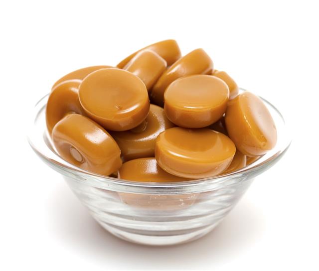Caramel Candies In A Glass Bowl