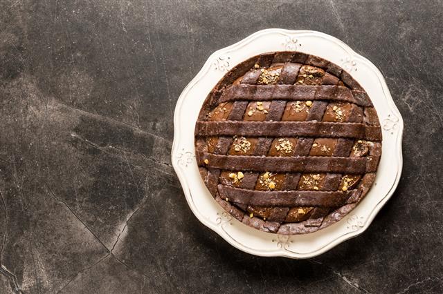 Chocolate Tart Pie Topped With Hazelnuts