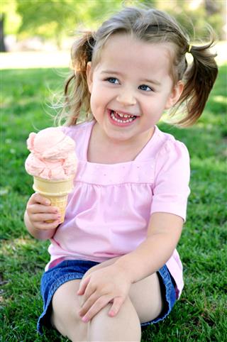 Young Girl Enjoying Ice Cream