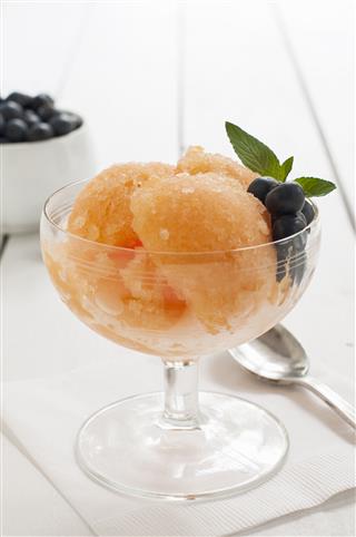 Bowl Of Cantaloupe Granita With Blueberries
