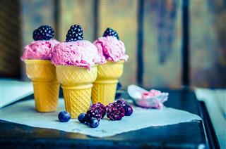 Ice Cream In Cones With Berries