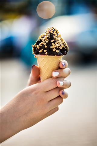 Ice Cream Cone With Nuts And Chocolate
