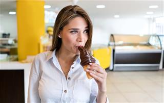 Woman Eating An Ice Cream Cone